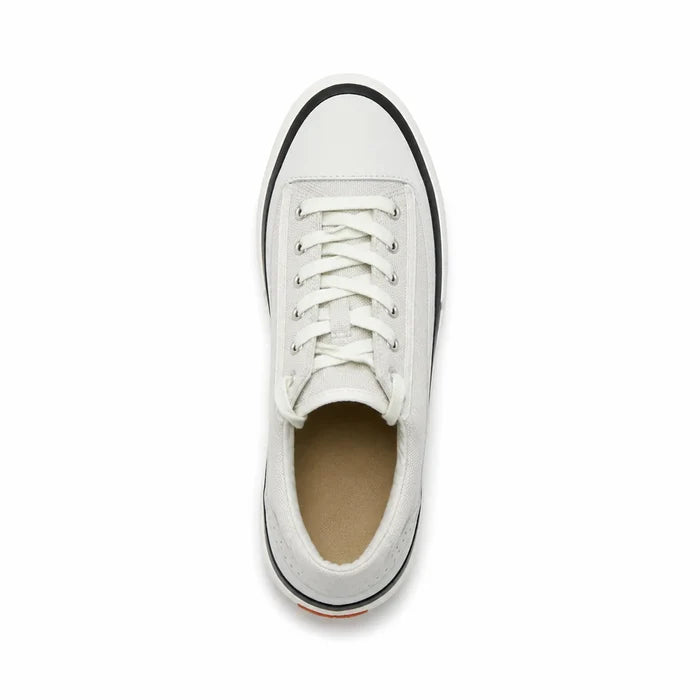 White lace-up sneaker with laces, tan insole, and black edge trim