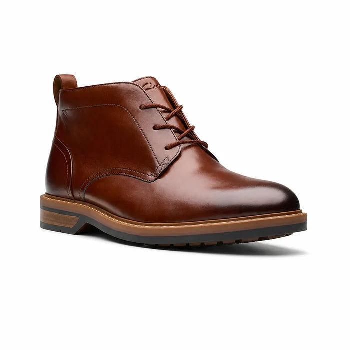 Men's brown leather chukka boots with lace-up front and stacked heel sole