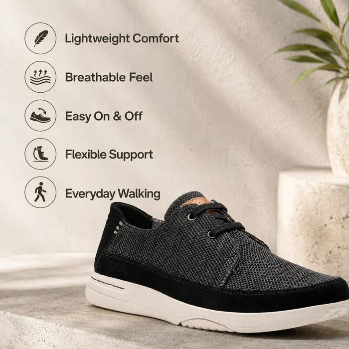 Men's black lace-up sneakers with breathable mesh upper and cushioned tongue, white sole