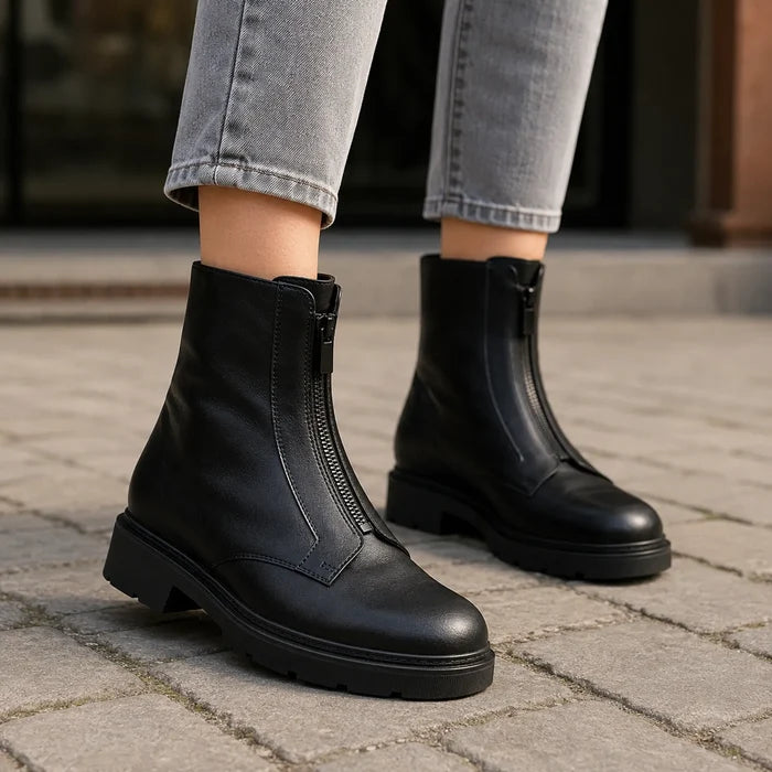 Black ankle boots with side zip and chunky lug sole