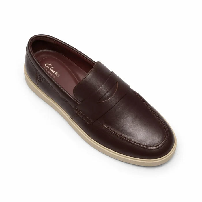Men's brown leather loafer slip-on, angled view showing padded collar and light sole
