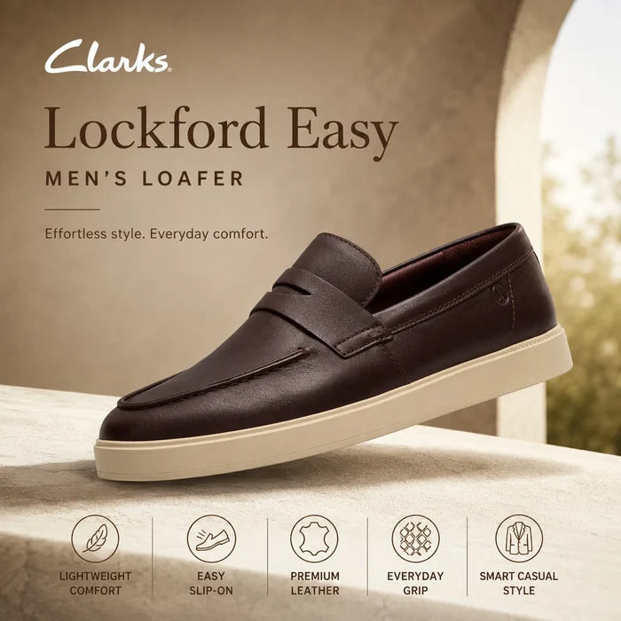 Men's brown leather slip-on loafer with strap detail and stitched apron over light sole