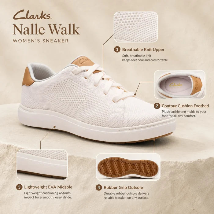 Women's white knit lace-up walking sneaker with visible rubber outsole tread
