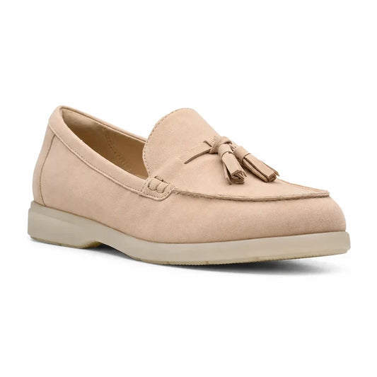 Women's light pink suede tassel loafers with slip-on design and moccasin stitching