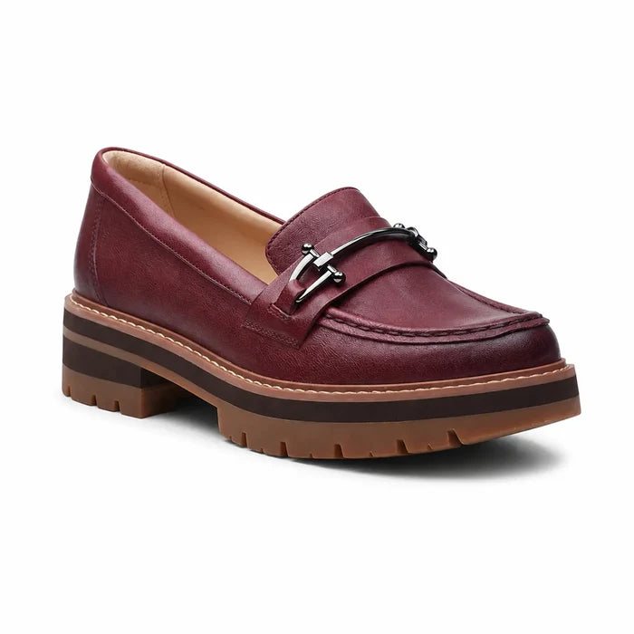 Oxblood leather loafer with metal bit detail and chunky platform sole, front angle