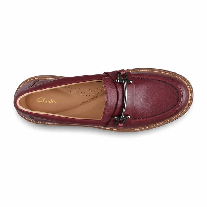 Oxblood leather bit loafers with metal bit strap and stitched moc toe