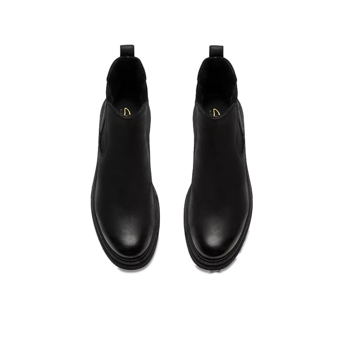 Pair of black leather ankle boots with elastic sides and rear pull tabs