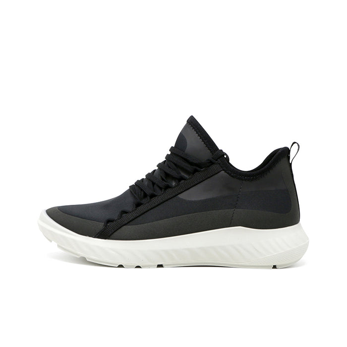 Black women's sneaker with lace-up front, sock-like collar, and white outsole