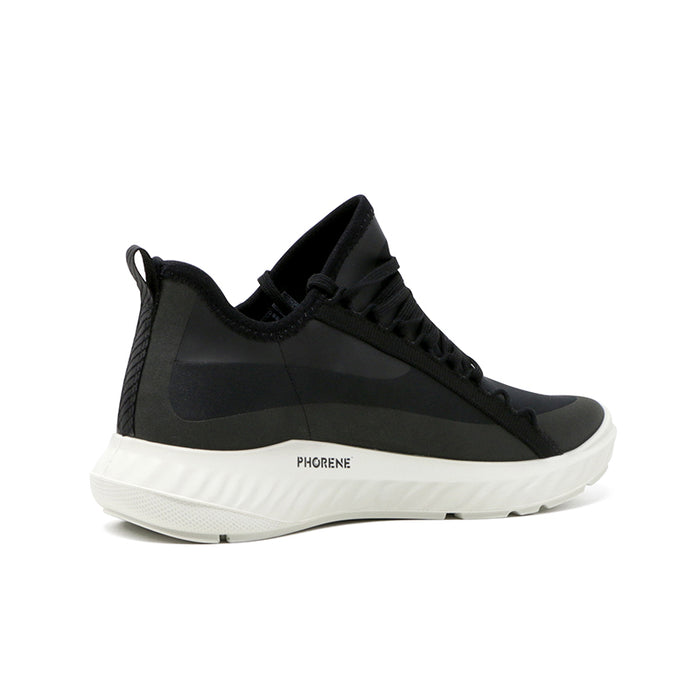 Black women's sneaker with lace-up front, elastic collar, and white sole