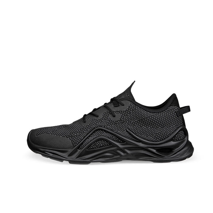 Black low-top lace-up sneaker with knit upper and chunky tread sole