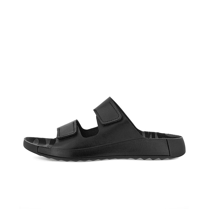 Black two-strap slide sandals with padded straps and textured sole