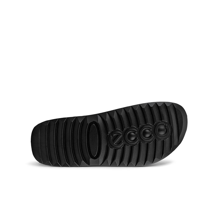 Brown slipper outsole view with textured tread pattern
