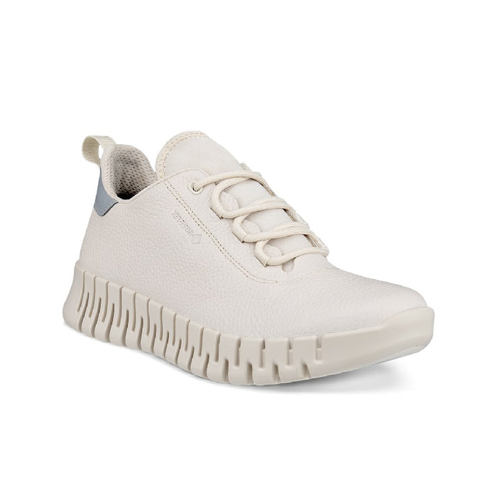 Light beige women's sneakers with lace-up front and chunky textured outsole