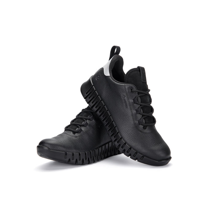 Black women's sneakers with lace-up closure and textured rugged outsole