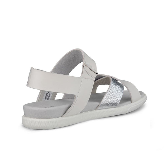 White leather sandals with backstrap, two front straps, and silver metallic footbed