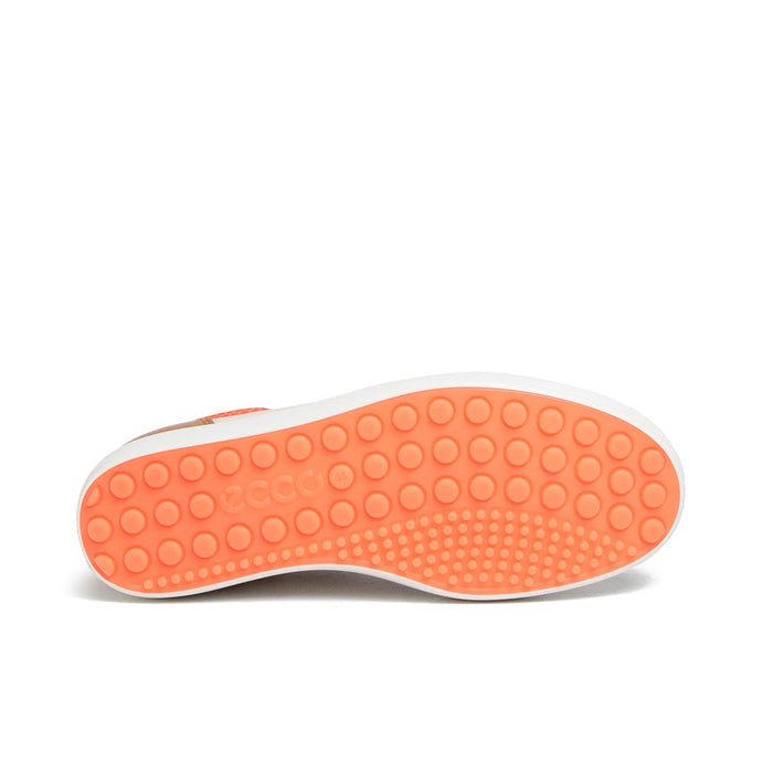 ECCO women’s sneaker outsole with textured circular tread in orange and white