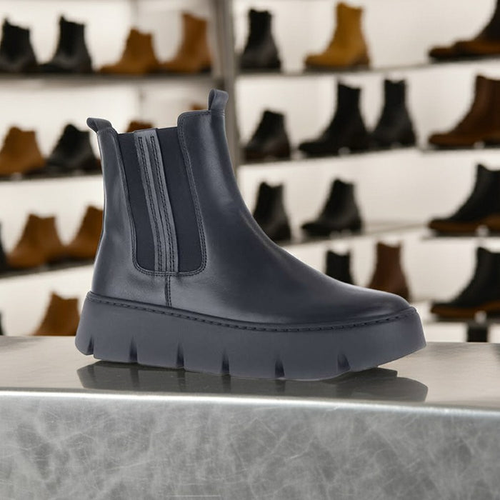 Black Chelsea ankle boots with side elastic panels and cushioned platform sole
