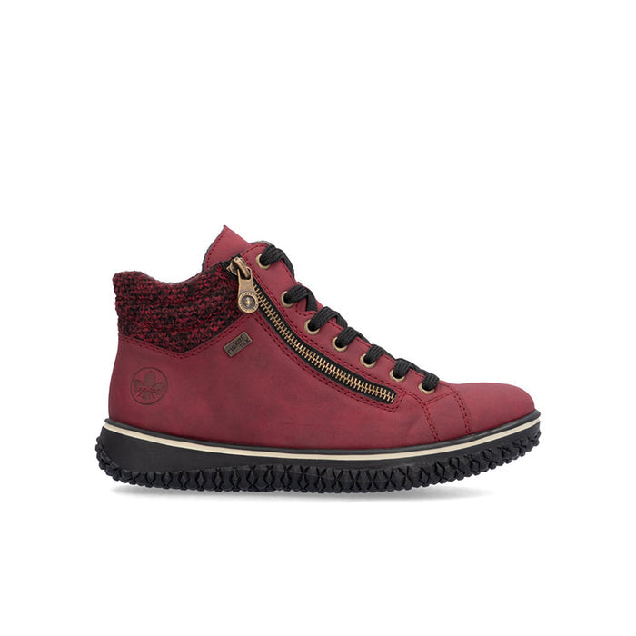 Red lace-up ankle boots with side zipper, fuzzy collar lining, and textured rubber sole