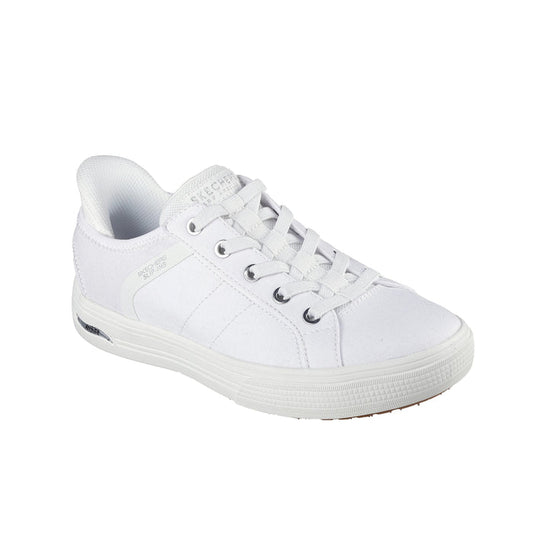 White canvas women's sneaker with lace-up front and low-profile rubber sole