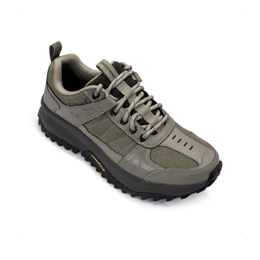 Men's trail sneaker in gray and dark, lace-up with chunky tread sole.