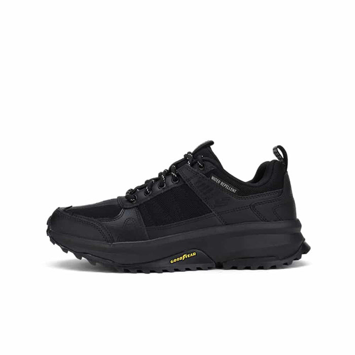 Men's trail sneaker in black with lace-up, cushioned collar, and rugged tread sole.