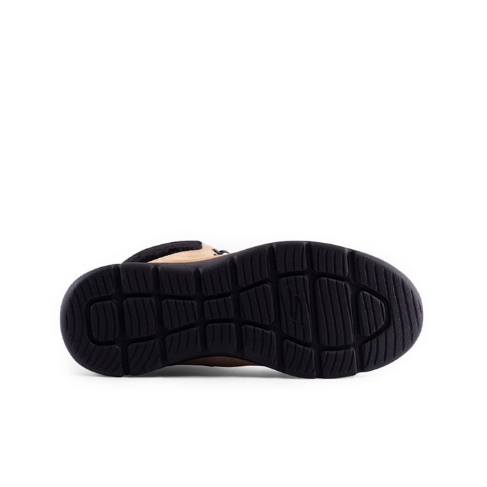 Boot outsole view: textured dark rubber tread on beige lace-up ankle boots