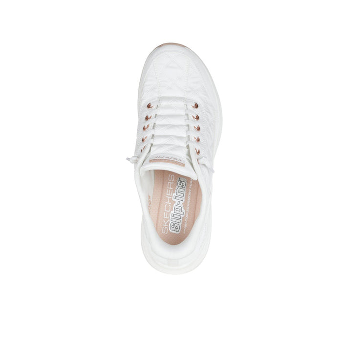 White women's sneaker with interior branding on the tongue