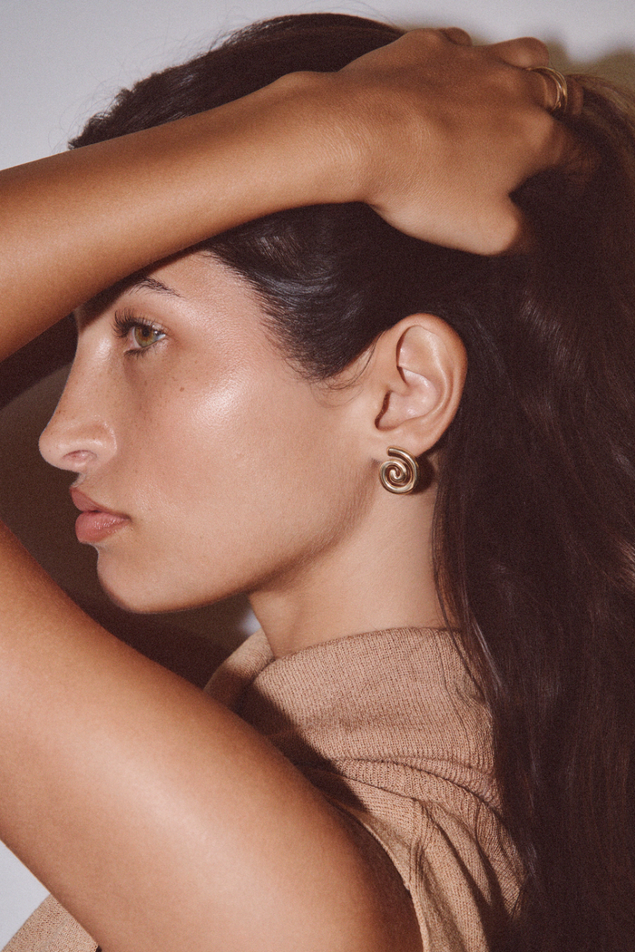 TWENTY COMPASS Boucles d'Oreilles Origine